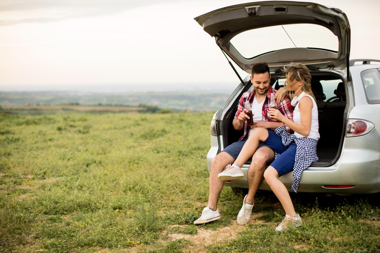 Happy family with their vehicle
